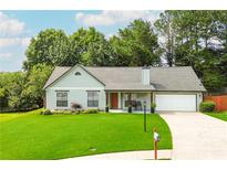Charming single-story home with a well-maintained front yard and inviting curb appeal at 787 Mckendree Lake Way, Lawrenceville, GA 30043
