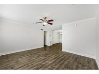 Bright living room featuring modern flooring and neutral walls at 2825 Northeast Ne Expy # F003, Atlanta, GA 30345