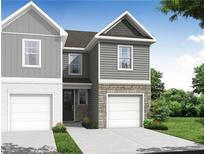 Beautiful two-story townhome with gray siding, white brick, and an attached one-car garage at 508 Crown Dr, Emerson, GA 30137