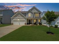 Charming two-story home with a well-manicured front yard and inviting curb appeal at 349 Garnet Dr, Acworth, GA 30101