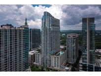 Stunning aerial view of high-rise luxury apartments with modern architectural design and breathtaking city views at 855 Peachtree Ne St # 3304, Atlanta, GA 30308