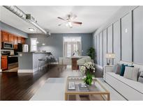 Modern living room with updated kitchen, dining area, and comfortable seating at 502 Pryor Sw St # 6, Atlanta, GA 30312