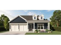 Charming home with white trim, two-car garage, and dormer windows at 400 Vinca Nw Cir, Kennesaw, GA 30144