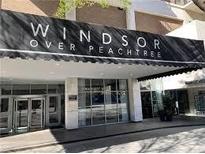 Windsor Over Peachtree entrance with covered portico and glass entry doors at 620 Peachtree #901 Ne St, Atlanta, GA 30308