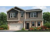 Charming two-story home featuring stone accents, vertical siding, and a two-car garage at 105 Crooked Lake Park, Villa Rica, GA 30180