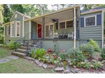 Charming single Gathering home with lovely landscaping and a cozy covered front porch at 958 Forrest Blvd, Decatur, GA 30030
