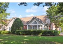 Charming one-story home with brick and siding, manicured lawn, and mature trees in a well-kept neighborhood at 3707 Vineyards Lake Nw Cir # 22, Kennesaw, GA 30144