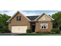 Charming brick home with attached garage, lovely landscaping, and classic architectural details at 114 Crooked Lake Park, Villa Rica, GA 30180