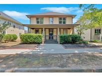 Charming two-story home features a welcoming front porch and well-maintained landscaping at 3278 Shakerley Park, Douglasville, GA 30135