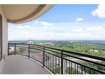 Relaxing balcony with sprawling city views and blue skies at 3445 Stratford Ne Rd # 3403, Atlanta, GA 30326