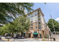 Upscale condo building features street-level retail and convenient access to restaurants and shops at 230 E Ponce De Leon Ave # 104, Decatur, GA 30030