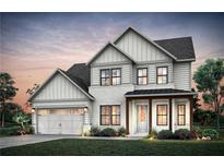 Charming two-story home with white brick and siding, a covered porch, and manicured landscaping at 4790 Wayt Farm Overlook, Cumming, GA 30040