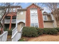 Charming townhome featuring brick accents, neutral siding, and well-maintained landscaping at 1731 Pryor Sw Rd # 307, Atlanta, GA 30315