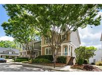 Charming two-story home with inviting front porch and mature trees in a friendly neighborhood at 2238 Parkview Nw Ct, Atlanta, GA 30318