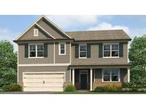 Charming two-story home with gray siding, shutters, and a welcoming front porch and attached two car garage at 904 Sundown Pt, Villa Rica, GA 30180