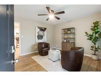 Bright sitting area featuring hardwood floors, stylish decor, and natural light streaming through the doorway at 2775 Belleau Se Ln, Atlanta, GA 30316