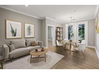 Inviting living room with modern furnishings and abundant natural light at 901 Abernathy Rd # 2200, Sandy Springs, GA 30328