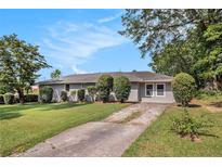 Charming one-story home featuring a well-maintained front yard and a classic, welcoming facade at 41 Elder St, Fairburn, GA 30213