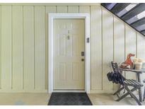 Inviting front entrance with decorative door and charming outdoor decor, creating a warm welcome at 5149 Roswell Rd # 1, Atlanta, GA 30342