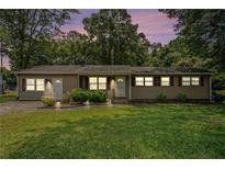 Charming single-story home with a well-maintained lawn and inviting curb appeal at 96 S Forty Pass S, Hiram, GA 30141