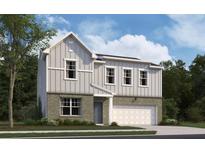Charming two-story home with brick and siding, a front-entry garage, and a well-maintained lawn at 133 Bandimere Pkwy, Dallas, GA 30157