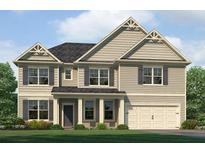 Charming two-story home featuring symmetrical design elements, a well-manicured lawn, and an attached two-car garage at 1816 Kingsmere Run Dr, Loganville, GA 30052