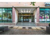 Peachtree Towers features a commercial entrance with package service on the main level at 300 Peachtree Ne St # 5A, Atlanta, GA 30308