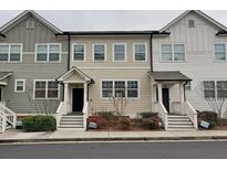 Well maintained townhouse with a front yard at 2163 Wiggins Walk, Atlanta, GA 30316