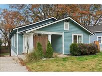 Charming single-story home with a quaint porch and inviting curb appeal at 761 Bellemeade Nw Ave, Atlanta, GA 30318