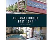 View of the community including swimming pool and building exterior at 870 Mayson Turner Nw Rd # 1344, Atlanta, GA 30314