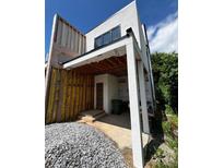 Under-construction home exterior featuring a modern design with a partial view of the entrance and building materials at 314 Fortune Ne St # B, Atlanta, GA 30312