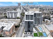 Luxury high-rise condo with rooftop pool, tennis court, and stunning city views of Lenox Mall in Buckhead Atlanta at 2479 Peachtree Road Northeast Ne Rd # 402, Atlanta, GA 30305