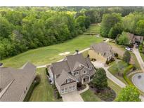 Gorgeous home with mature landscaping and golf course views in a desirable neighborhood at 44 Kingsford Xing, Acworth, GA 30101