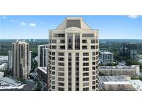 An impressive exterior view of a high-rise building with stunning architecture and large windows at 3475 Oak Valley Ne Rd # 2820, Atlanta, GA 30326