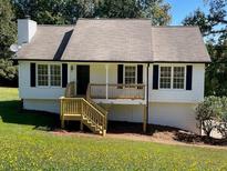 Charming one-story home with a new front porch, fresh paint, and landscaped front yard at 44 Fawn Trl, Hiram, GA 30141