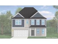 Charming two-story home with a two-car garage and a mix of brick and blue siding, creating a stylish exterior at 2575 Dixon Pl, Lawrenceville, GA 30045