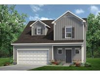 Charming two-story home with gray siding, a two-car garage, and well-manicured front lawn at 27 Kensington St, Kingston, GA 30145