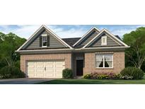 Charming single-story brick home featuring an attached garage and meticulously landscaped front yard at 109 Crooked Lake Park, Villa Rica, GA 30180