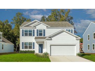 Two-story white house with blue shutters, two-car garage, and landscaped lawn at 132 Morning View Way, Moncks Corner, SC 29461