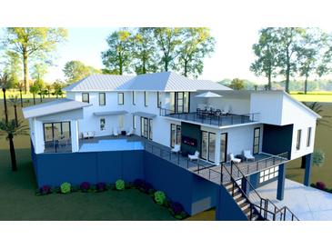Two-story home with pool, deck, and modern design at 35 W 9Th Street Ext, Folly Beach, SC 29439