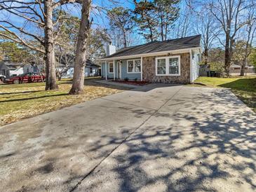 Cute ranch home with stone accents and a large driveway at 110 Manchester Rd, Summerville, SC 29486