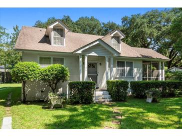Charming 1-story house with a well-manicured lawn and mature trees at 2028 Coker Ave, Charleston, SC 29412