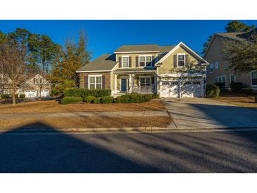Two-story house with stone accents and a two-car garage at 101 Ribbon Rd, Summerville, SC 29483