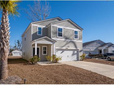 Two-story home with gray siding, white garage door, and landscaping at 134 Vistawood Dr, Charleston, SC 29414