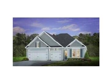 Two story home with gray siding, white trim, and three car garage at 211 Bilge Rd, Ridgeville, SC 29472