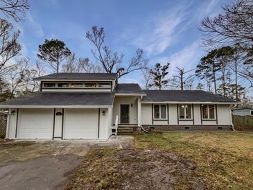 Newly renovated house featuring a two-car garage and updated exterior at 119 Sumners Aly, Summerville, SC 29485