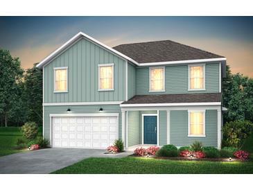 Two-story house with light green siding, white garage door, and landscaping at 225 W West Bradford Pointe Dr, Summerville, SC 29483