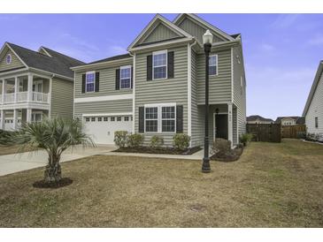 Two-story house with gray siding, black shutters, and a two-car garage at 484 Whispering Breeze Ln, Summerville, SC 29486