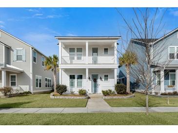 Two-story house with white siding, front porch, and landscaping at 212 Magnolia Garden Dr, Summerville, SC 29483