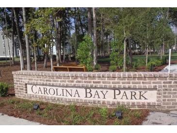 Carolina Bay Park entrance, brick sign, landscaping, welcoming community feel at 4111 Collins Dr, Charleston, SC 29414